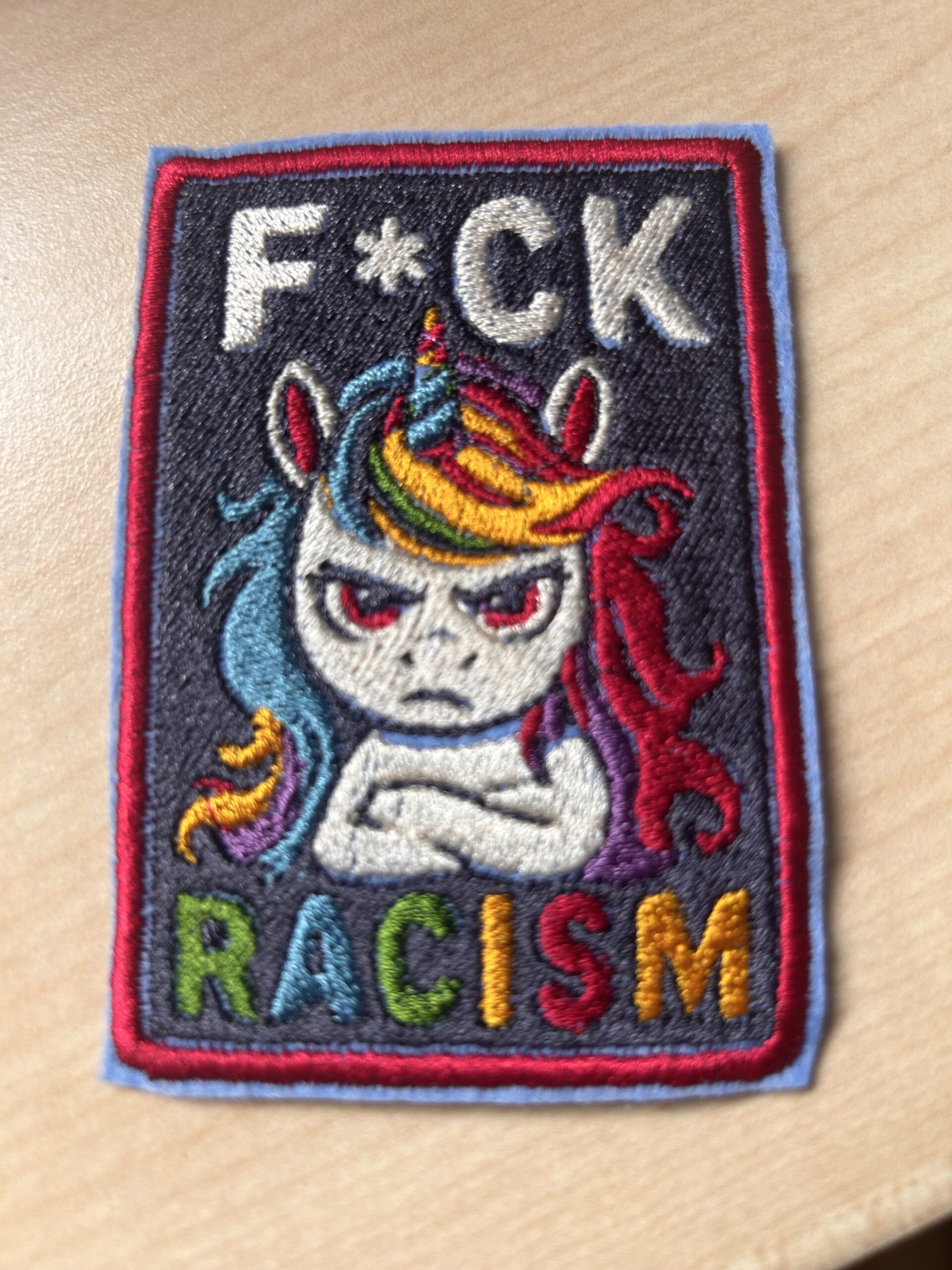 "F*ck Racism"
